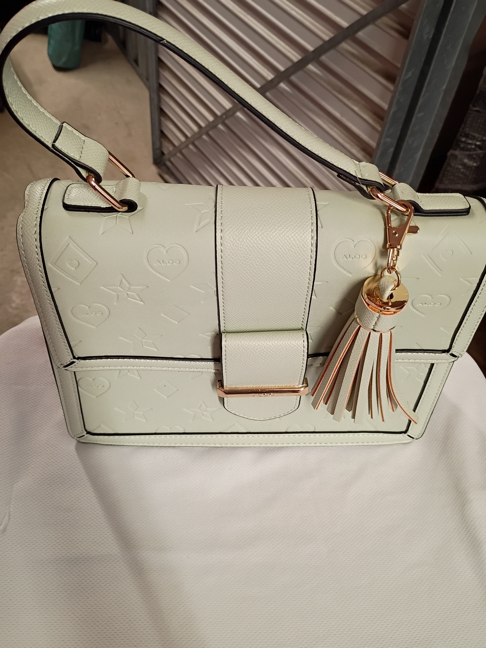 ALDO Cream Embossed Crossbody Bag with Tassel Charm